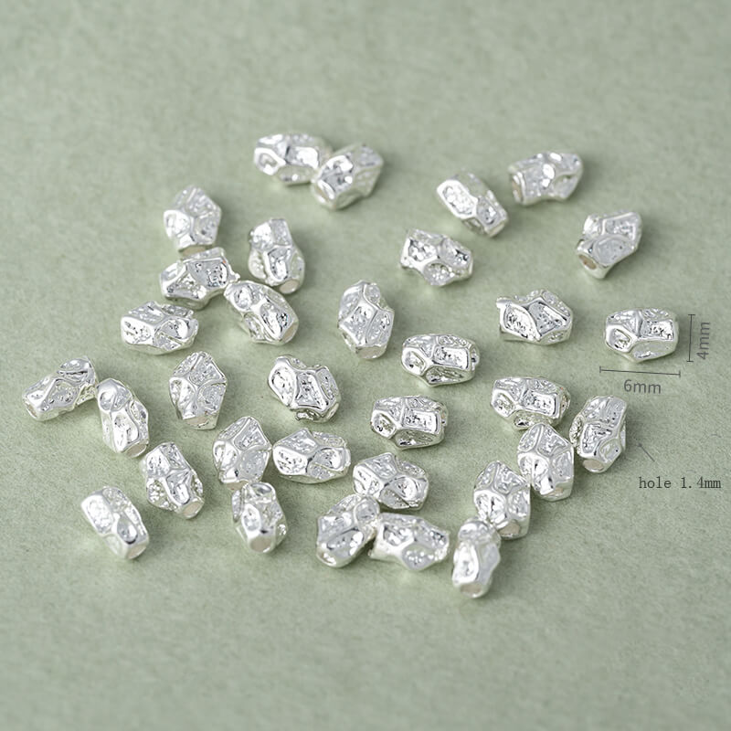 Copper-clad thick sterling silver irregular stone-shaped spacer beads
