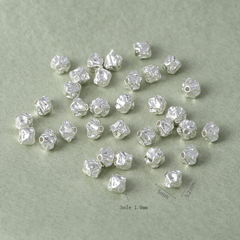 Copper-clad thick sterling silver irregular stone-shaped spacer beads