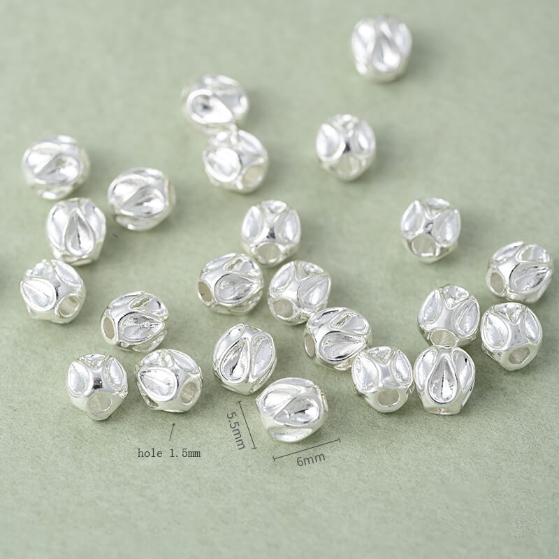 Copper-clad thick sterling silver irregular stone-shaped spacer beads
