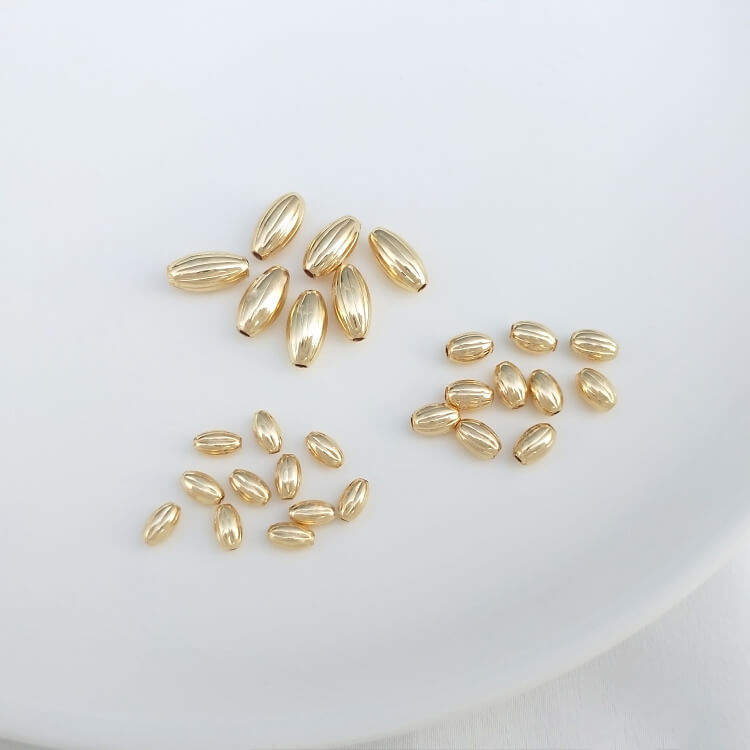 Glossy melon pattern rice-shaped spacer beads 50 pieces