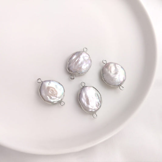 16×25mm natural baroque pearl double-hole connector pendant in platinum plating.