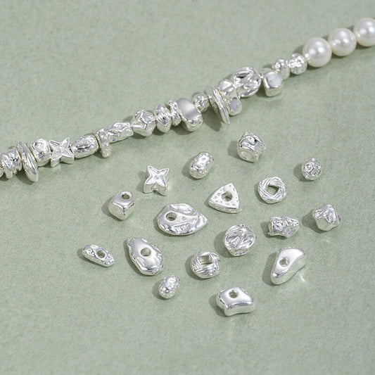 Copper-clad thick sterling silver irregular stone-shaped spacer beads