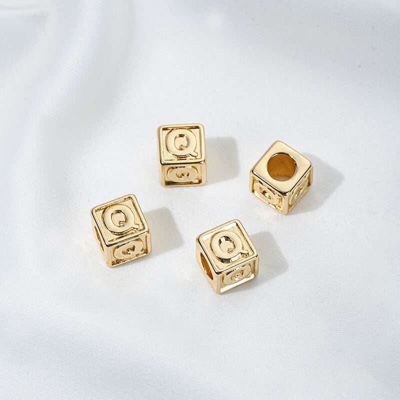 Titanium steel with gold-plated 26 letters square through-hole relief spacer