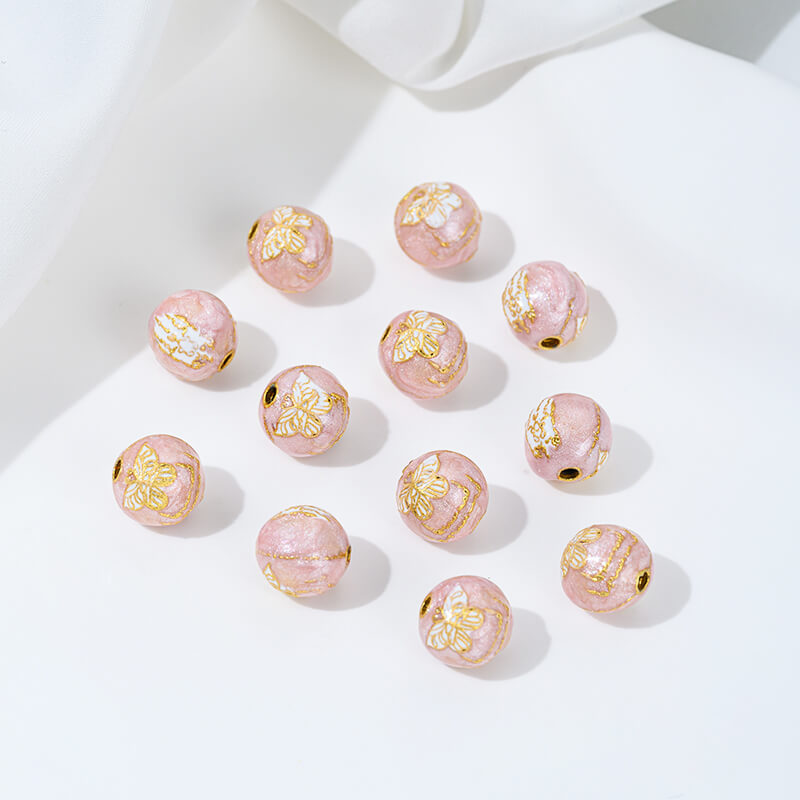 Gold-dripped cloisonne pink peach blossom hollow sphere copper coin lotus butterfly spacer beads